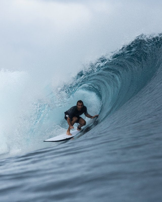 Joan duru in teahupoo spot on a pick pocket surfboard SIC MAUI